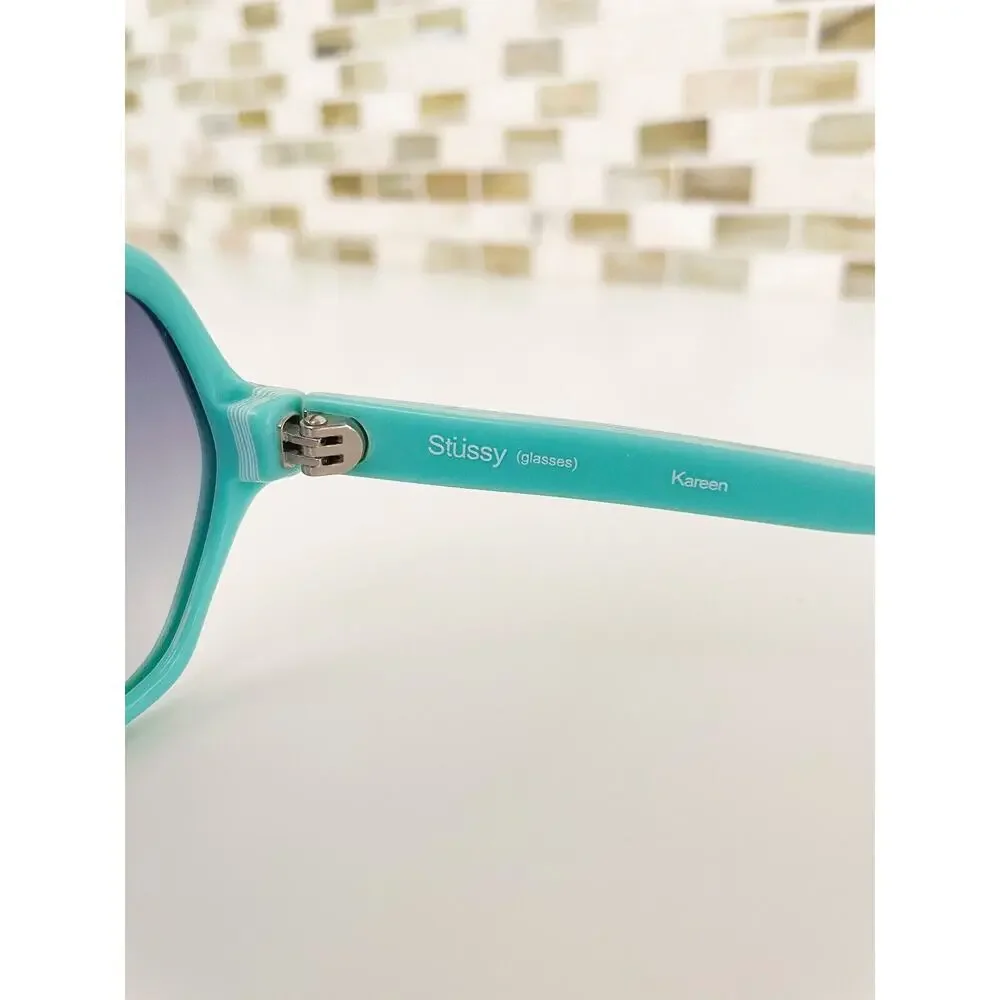Stussy Mint Green Shield Sunglasses with Gradient Smoke Lenses